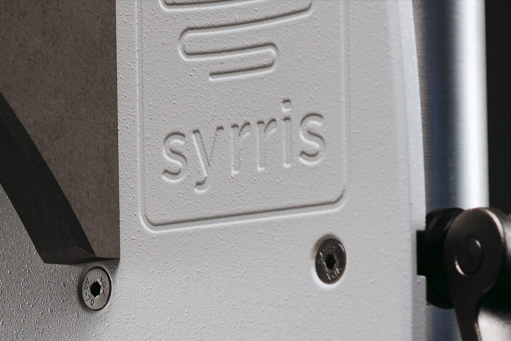 A close up photograph of the Syrris logo on the Orb Jacketed Reactor frame